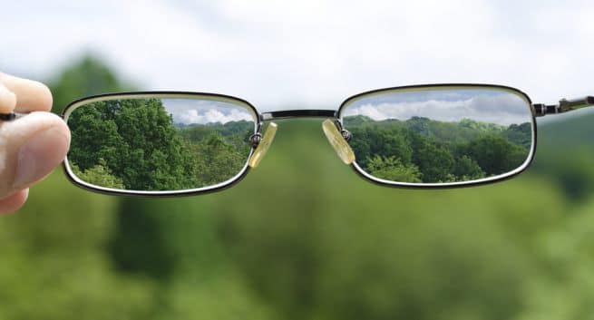 What are some symptoms and causes of vision problems?