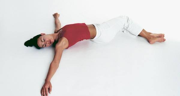 lying down body twisting asana
