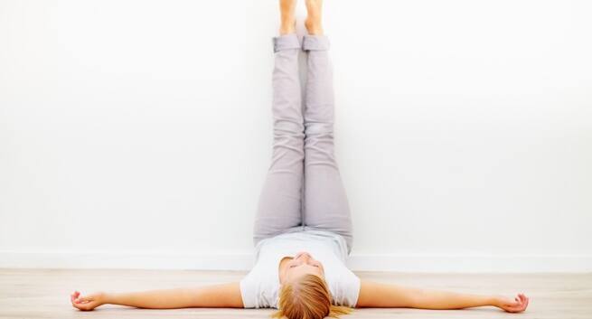 Fitness-yoga-viparita-karini-yoga poses that will help you cool off during summer