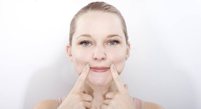 Smiling-gives-you-a-good-facial-exercise fun facts you never knew about your SMILE