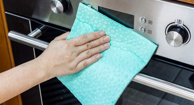 Using harsh chemicals to clean dirty spots