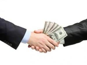 Handshake with money