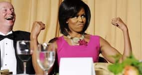 First Lady Michelle Obama throws punches and lifts dumbbells to stay fit