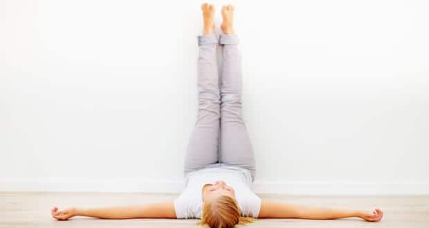 Legs up the Wall Pose, Viparita Karani, Inverted Pose Young attractive  woman practicing yoga exercise. working out, black wearing sportswear, grey  pants and top, indoor full length, calmness Stock Vector | Adobe