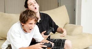 Playing online games is linked to better performance at school among  teenagers