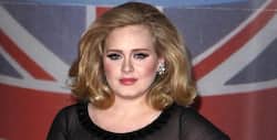 Adele flaunts a slimmer face after losing weight