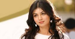Vegan Ayesha Takia poses with chick for PETA