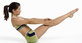 Get flatter abs with the V-sit exercise