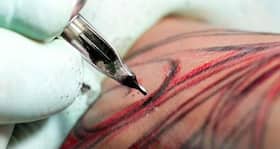 Can I donate blood if I get a tattoo?