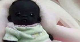 Two reasons the world's darkest baby is a fake Two reasons the world's darkest baby is a fake