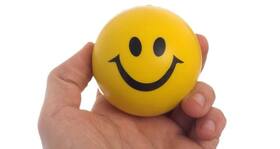 Does squeezing a stress ball help in relieving stress?