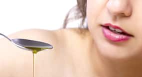 Oil pulling--Use coconut oil to prevent gum diseases