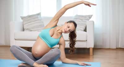 Daily Exercise Tip: Gentle side stretch for pregnancy induced backache (Video)