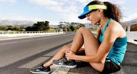 For how long should you treat a sprain at home, and when should you consult a doctor?