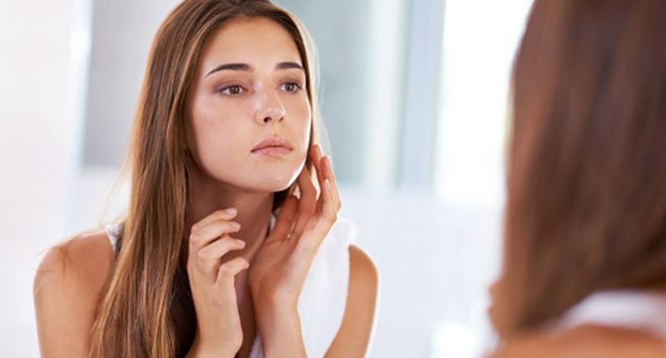 What causes acne on your forehead, eyebrows, cheeks, nose, upper lip and chin?