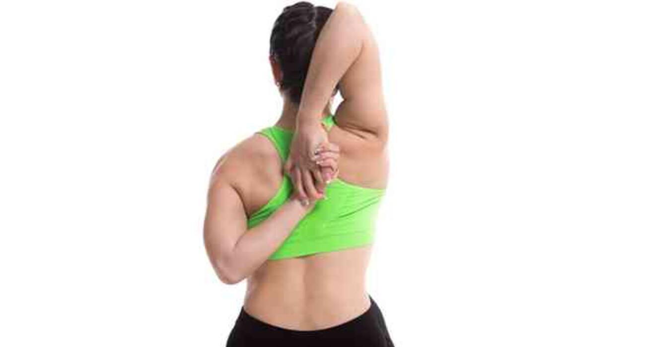 5 easy yoga stretches to do in the office restroom