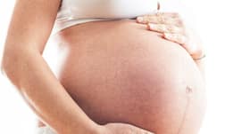 Should I be worried about the black line (linea nigra) on my belly during pregnancy? (Query)