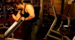 Get bigger biceps with dumbbell curls and concentration curls