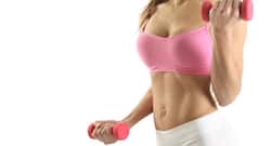 5 easy dumbbell exercises that will help you sculpt flat abs