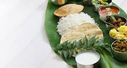 What is the significance of the ancient practice of sprinkling water around food?