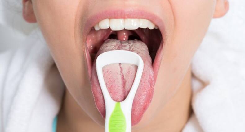 5 gross things that happen when you don't clean your tongue