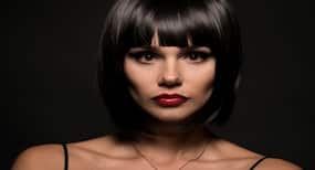 Here's a step-by-step guide to fake bangs without getting a haircut