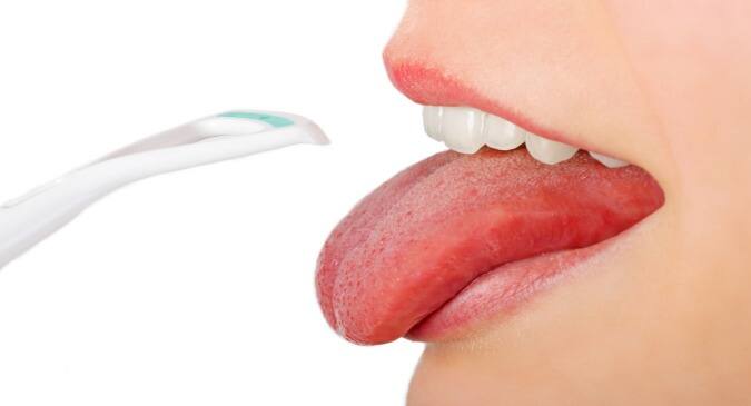 Here's why you might be getting that white film on your tongue |  TheHealthSite.com