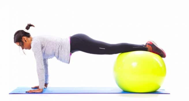 Do push-ups on a Swiss ball for stronger and leaner arms ...