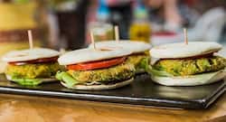 Healthy vegetarian snack recipe: green peas pita burgers with mint pesto