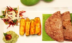 Healthy raw mango meal: Traditional raw mango pickle, chutney and salad with nachni bhakri Healthy raw mango meal: Traditional raw mango pickle, chutney and salad with nachni bhakri