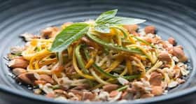Healthy dinner recipe: Zucchini spaghetti with almonds, fresh tomato and basil Healthy dinner recipe: Zucchini spaghetti with almonds, fresh tomato and basil