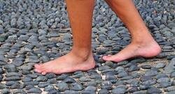 Go barefoot on cobblestones for a better health