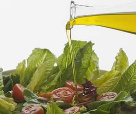 Weight Loss Tip #54: Replace creamy salad dressing with olive oil or vinegar Weight Loss Tip #54: Replace creamy salad dressing with olive oil or vinegar