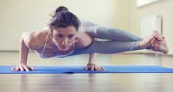 Bhujapidasana or The Shoulder-Pressing pose -- a yoga asana for a flat tummy and strong arms