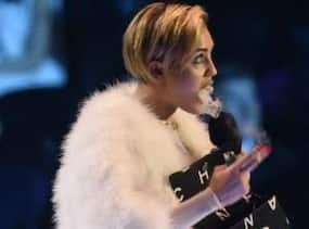 Miley Cyrus lights up a marijuana joint on stage!