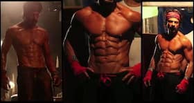 Happy New Year: Shah Rukh Khan's workout video shows his '10-pack-abs' aren't fake at all! Happy New Year: Shah Rukh Khan's workout video shows his '10-pack-abs' aren't fake at all!