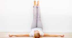 Viparitakarani asana -- a yoga pose to relieve neck and back pain