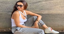 Actor Malaika Arora aces a new yoga pose and sets an example for her fans too!