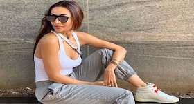 Actor Malaika Arora aces a new yoga pose and sets an example for her fans too!