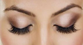 Want to get long and thick eyelashes? Ditch those eyelash extensions and pick up a bottle of castor oil instead
