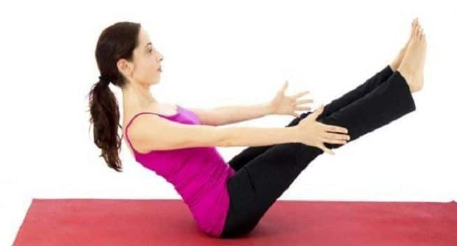 Yoga asanas for flat belly in under a week | TheHealthSite.com