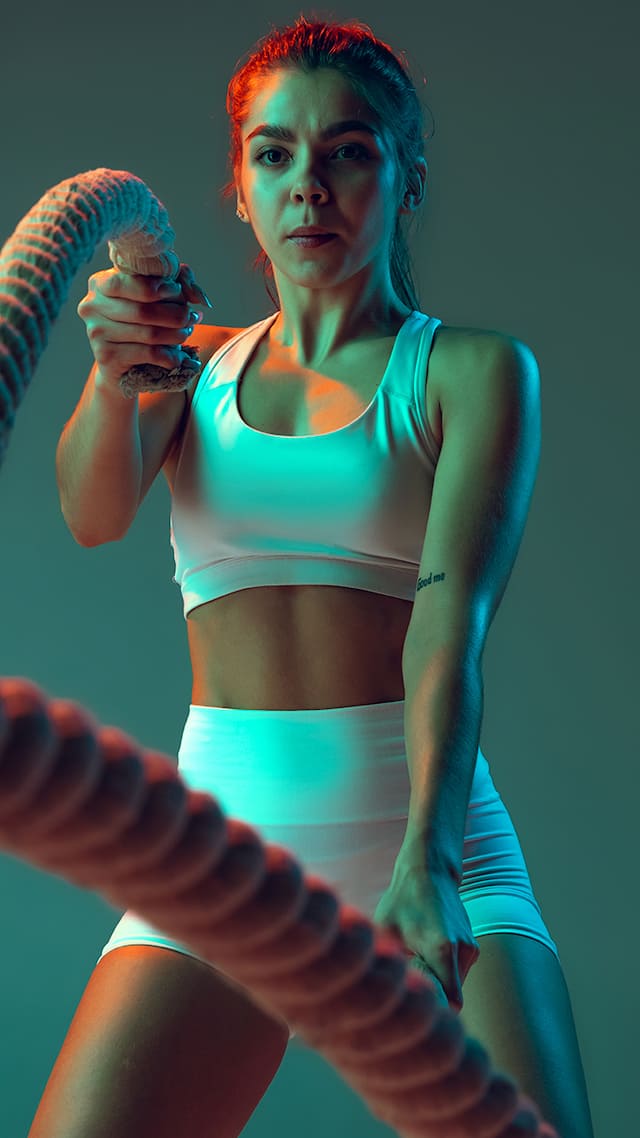 https://st1.thehealthsite.com/wp-content/uploads/2022/11/portrait-young-spotive-girl-doing-exercises-with-rope-keeping-body-fit-isolated-green-background-neon-1.jpg?impolicy=Medium_Widthonly&w=640