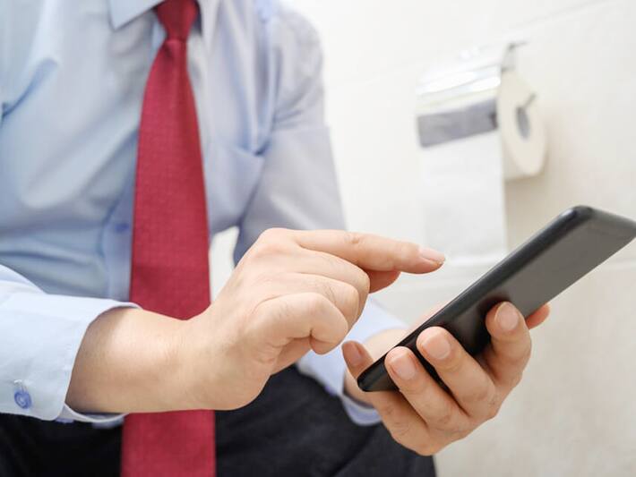 Using Phone In Toilet? Here's How It Can Damage Your Health Slowly