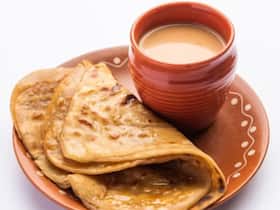 Paratha and Chai In the Morning: 6 Side Effects of Having Paratha With Milk Tea On Empty Stomach Paratha and Chai In the Morning: 6 Side Effects of Having Paratha With Milk Tea On Empty Stomach