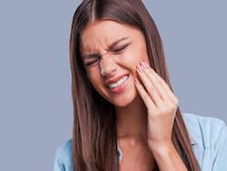 What Symptoms Might Indicate That A Person Is Experiencing Dental Problems?