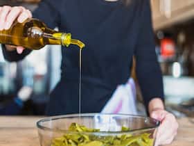 Ditch Refined Oil And Pack Your Kitchen Shelf With These 3 Essential Oils
