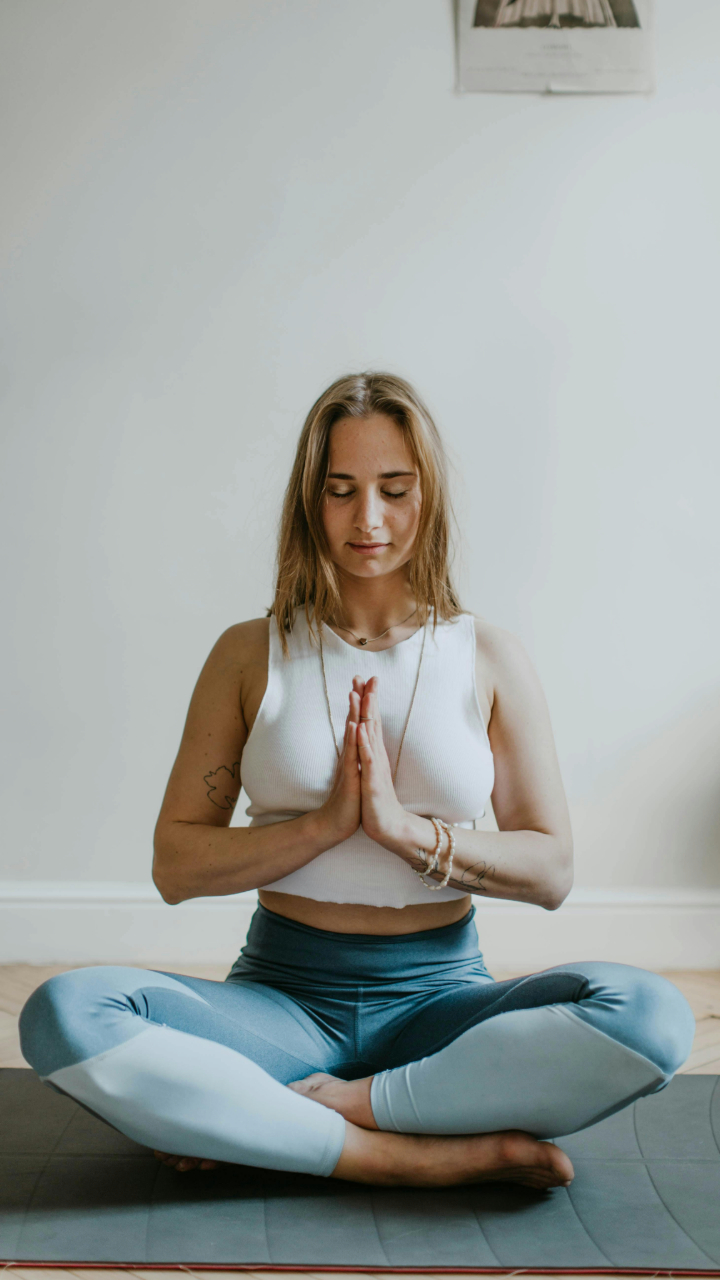 8 Yoga Poses for Summer Migraines