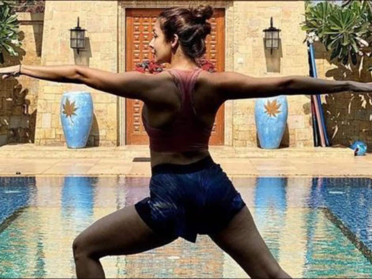 Warrior Pose I ( Virabhadrasana I) By Malaika Arora