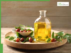 5 Best oils to mix with Jojoba oil for new hair growth on oily scalp