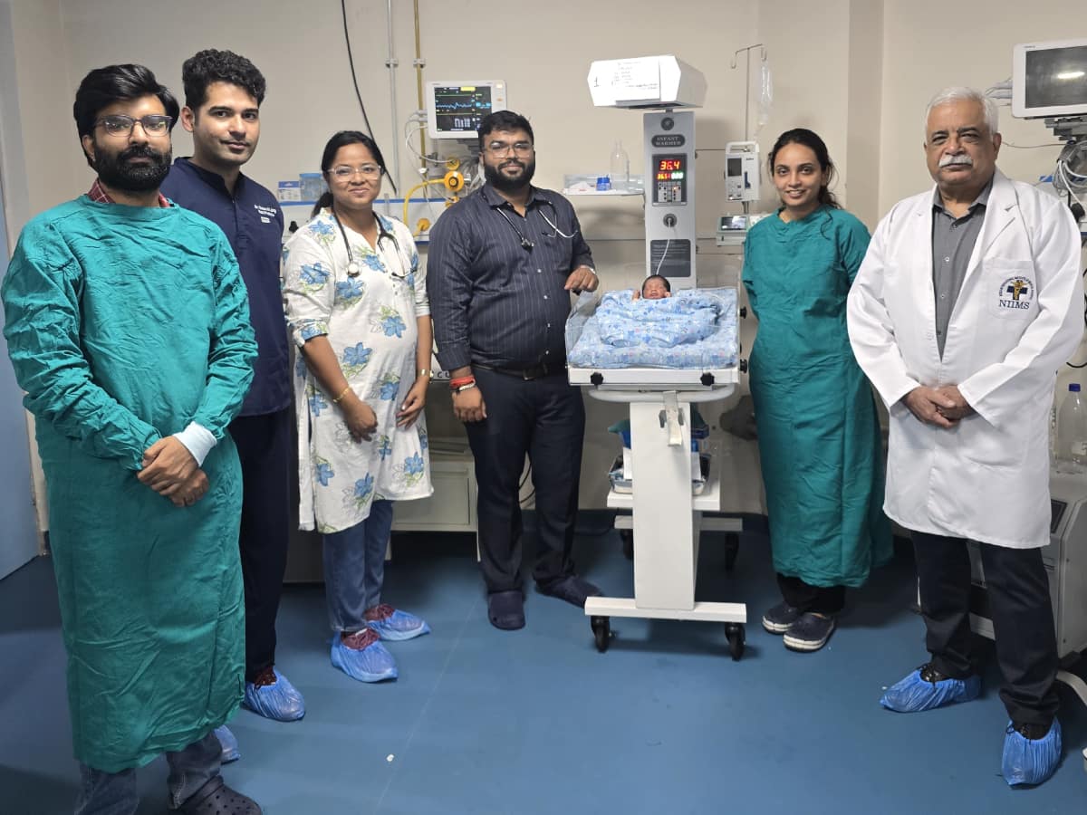 doctors in emergency with patient newborn baby